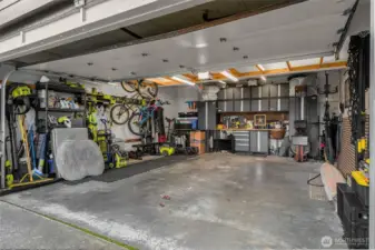 Tesla EV charger in large garage