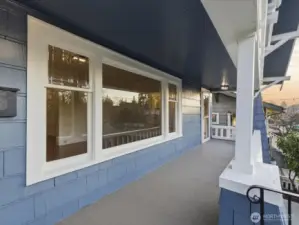 Magnificent covered front porch with views to the park across the street.
