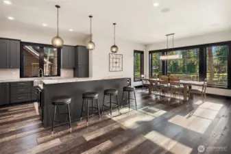 Open-concept interiors and large windows allow an abundance of natural light