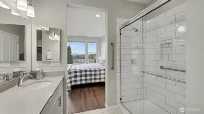 Luxury vinyl flooring in the primary bathroom with durability and style