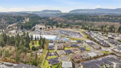 Meadow Ridge residents also enjoy access to a neighborhood clubhouse available for gatherings and events, and the HOA fee includes front yard maintenance. Ideally located near Maple Valley shops, restaurants, parks, and local amenities, this home offers convenient, low-maintenance living in a welcoming community.