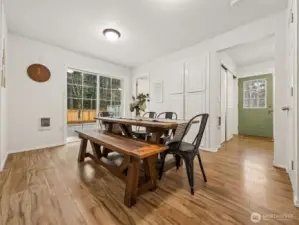 Large dining area with slider to the back yard.