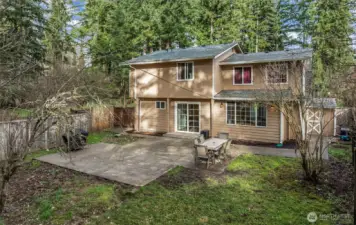 Backyard is fully fenced with large patio.  Enjoy the outdoors!