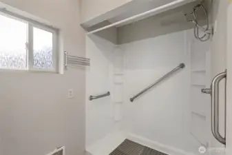 Shower area in the 3/4 bathroom laundry on the main level of the 2nd area