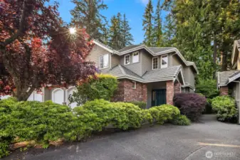 This exceptional end-unit townhome in 'The Masters' offers refined living in a highly sought-after community.