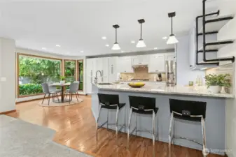 oak hardwood flooring in kitchen with amazing dining area