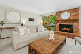 brick gas fireplace in family room