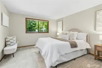 Main floor 2nd primary bedroom with ensuite