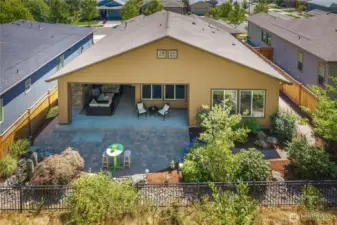 Two covered patios, stone fireplace and extensive hardscape make outdoor entertaining a blast!