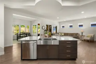 Spacious great room filled with abundant natural light. Gorgeous Engineered hardwoods, beautiful Quartz island and a convenient single sink.