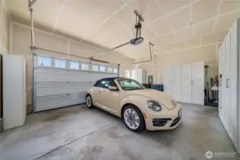 Oversized 2.5+ garage with tons of space for storage and a handy garage service door.