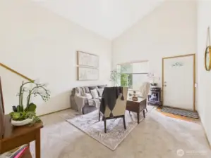 This large, airy living room welcomes you in.