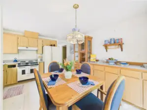 This eat-in kitchen has lots of storage for all your gadgets and dishes.