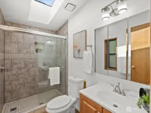Primary bathroom with tiled shower