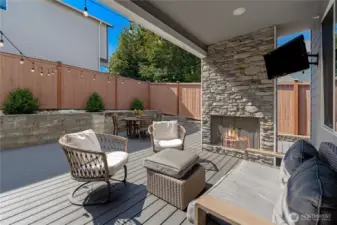 Gas fireplace, TV, and premium composite decking