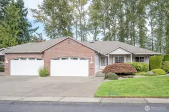 Experience easy one-level living in the desirable, gated community of Arabella - Elegant first impression.