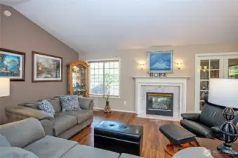 Sophisticated open-concept design complemented with vaulted ceilings.