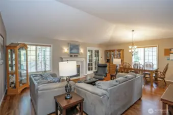 Sunlight floods the living room through stunning new windows.