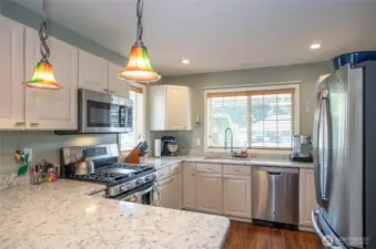 Sleek Granite countertops add a touch of sophistication.
