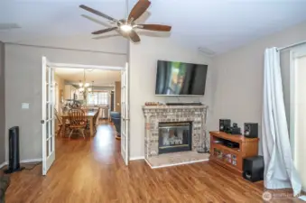 A charming two-sided fireplace brings warmth and comfort.