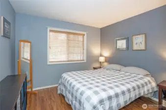 Thoughtfully appointed guest suite enhances the home’s versatile layout.