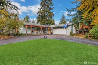 Front of home. Lot's of parking, room for small RV.