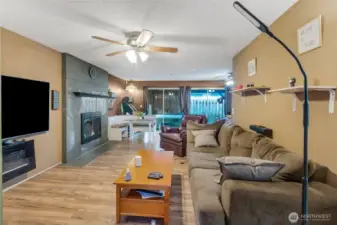 Large living area with fireplace.