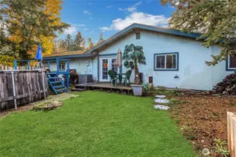 Backyard with deck off bedroom