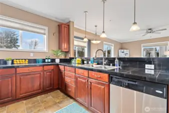 Gourmet Kitchen with stainless steel appliances and tons of storage & counter space for all your cooking and baking needs.