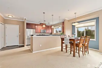 Another view from the living to the dining with windows overlooking the greenbelt! Tons of privacy and light throughout!