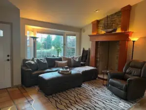 LIVING ROOM WITH PEEK A BOO VIEW OF MT RAINIER