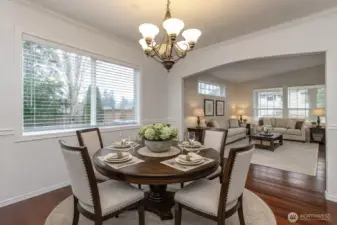 Formal dining and living rooms (virtually staged)