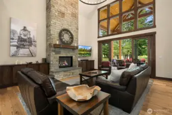 Stone floor to ceiling fireplace