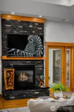 Cozy fireplace feature adds warmth and character.