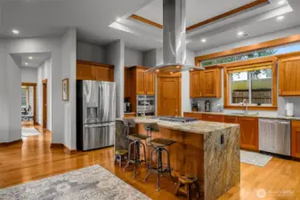 Large chef’s kitchen with generous counter space and storage.