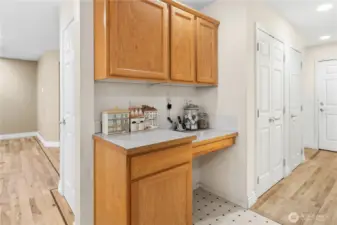 Kitchen desk area and ample cabinetry