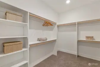 The expansive Primary Closet offers space to hang, stack and store all your clothing, shoes and accessories.