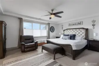 Large primary with room for a king sized bed.