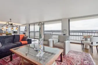 Large windows align with the length of the water view side.