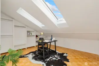 Office / flex space with newer skylights and built-in shelving