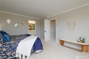 From the primary bedroom step into the spa-like en suite bathroom.