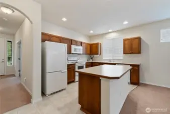 Open floor kitchen/living room layout. It is clean and very well maintained.
