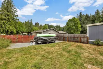 Ample parking for boat or camper behind double gate fence