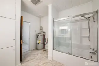 Laundry hook ups by water tank