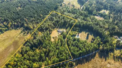This home is very private, situated on 19.24 acres and surrounded by a mature forest. Tranquility and timber value! Property lines are approximate.