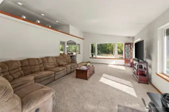 Another view of the ginormous family room, complete with vaulted ceilings.