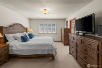 Love the plantation shutters in each of the bedrooms! The primary suite has an attached bath and walk in closet.