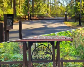 The home is located just inside the gate of the Jackson Forest, within the McKenna Forest Reserve. This gated community is more than 4,100 acres total, comprised of 20 acre parcels, divided into six neighborhoods. The road is paved, as is the driveway of this home.