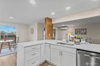 Conversation and open space adorn this breakfast bar & prep area. Easy to visit with family, friends or guests, and no seclusion from dining or rec area. A true GREAT room concept.