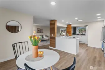 Dining room with reverse view to kitchen